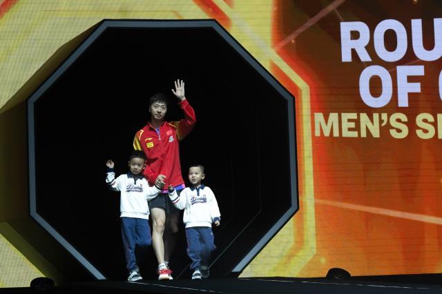 开云体育入口-马龙携子亮相大满贯赛场 36岁的老将还想赢还能赢